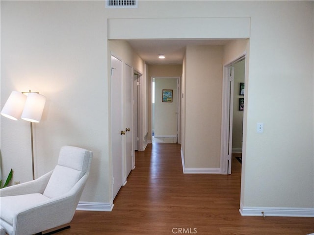 hall featuring dark hardwood / wood-style flooring