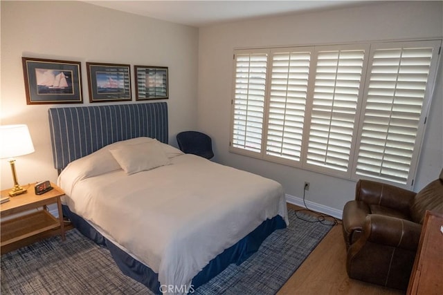 bedroom featuring hardwood / wood-style floors