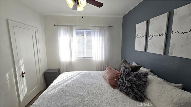 bedroom featuring ceiling fan