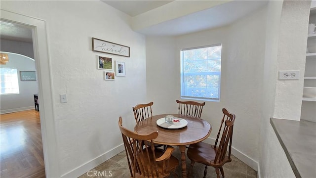 dining area with a wealth of natural light