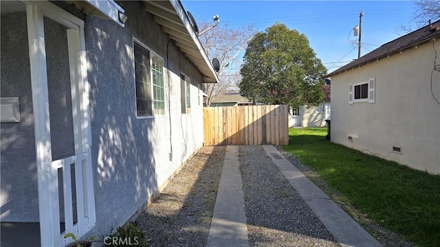 view of home's exterior featuring a lawn