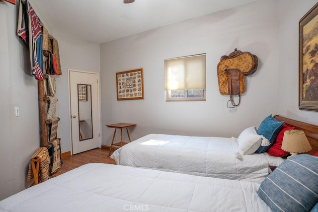 bedroom with light hardwood / wood-style flooring