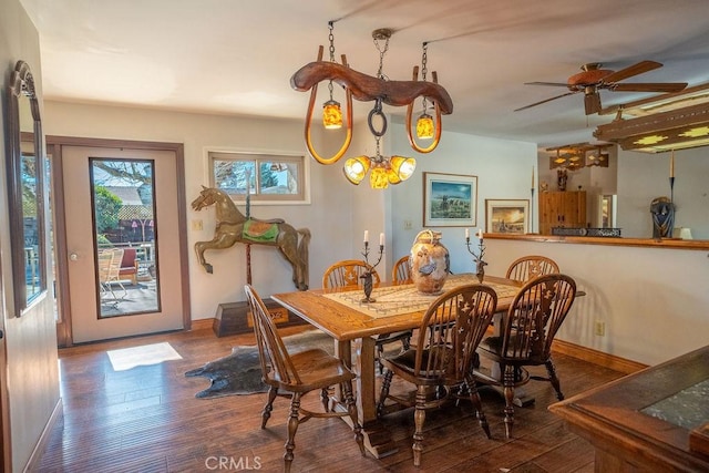 dining area with hardwood / wood-style floors