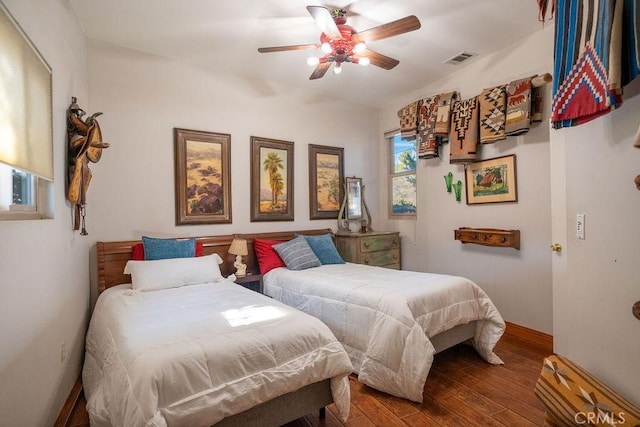 bedroom featuring ceiling fan and wood-type flooring