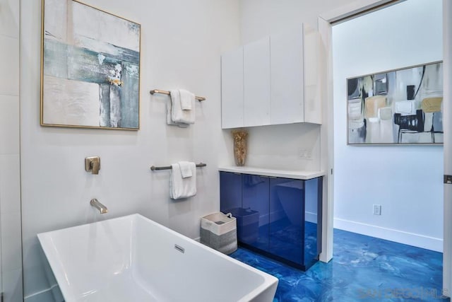 bathroom featuring a tub to relax in