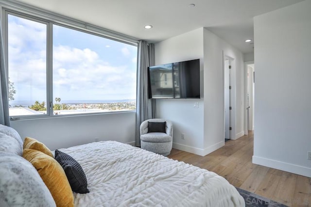 bedroom featuring light wood-type flooring