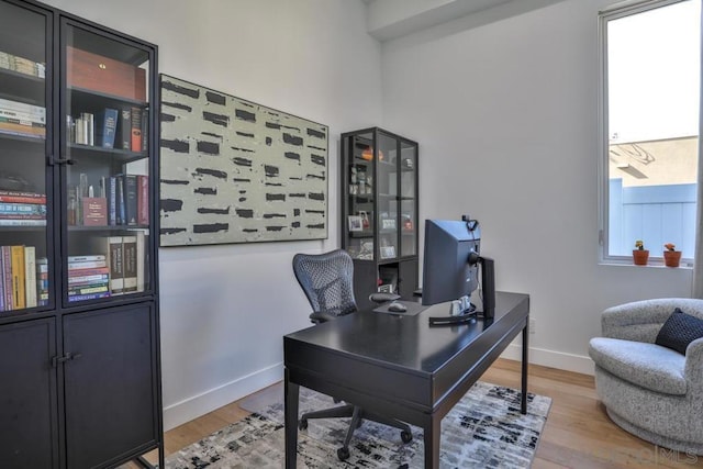 office area with light wood-type flooring