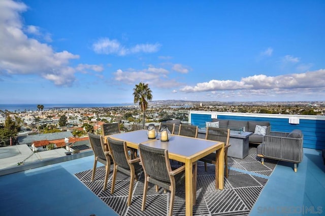 view of patio featuring a water view and an outdoor hangout area