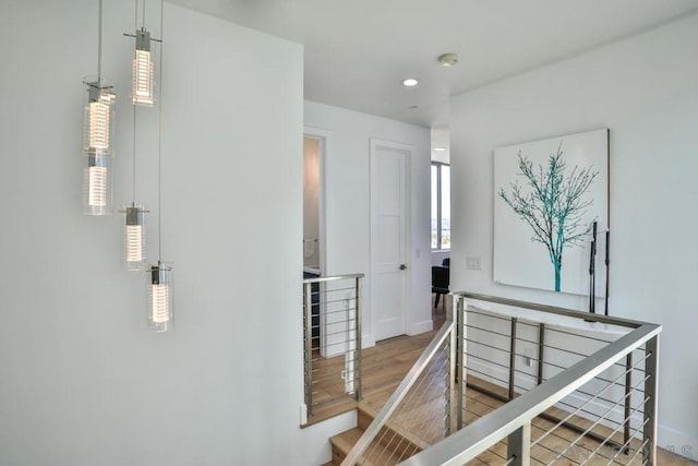 corridor featuring hardwood / wood-style floors