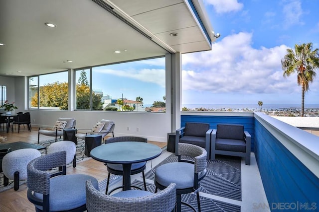 view of patio featuring a balcony and outdoor lounge area