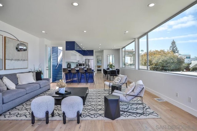 living room featuring light hardwood / wood-style flooring