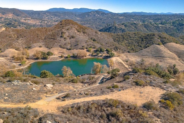 aerial view with a water and mountain view