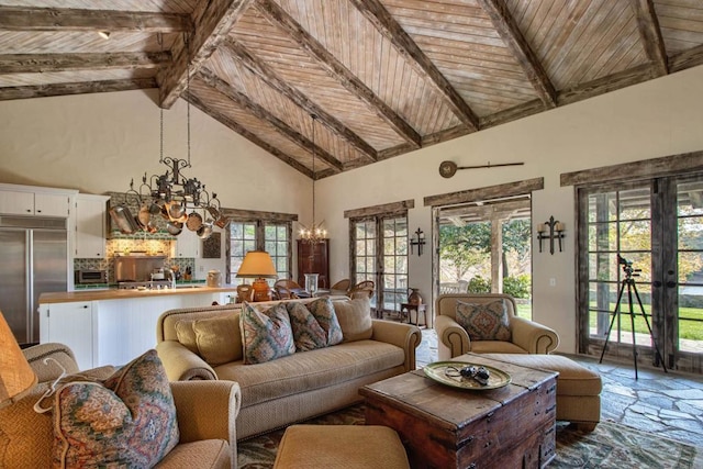 living area with a chandelier, wood ceiling, and french doors