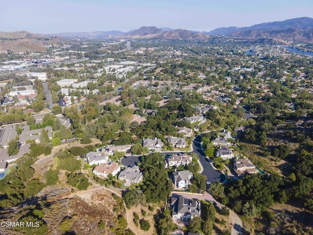 drone / aerial view featuring a mountain view