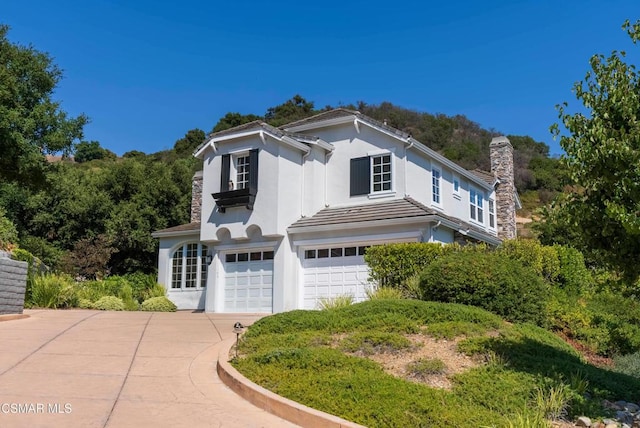 view of front of home featuring a garage