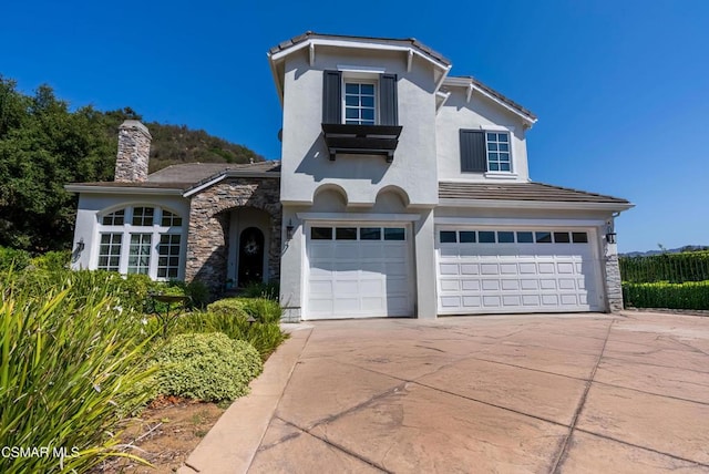 view of front of house with a garage