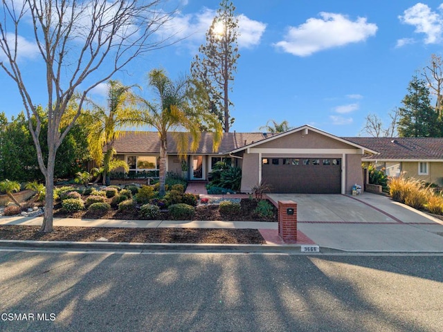 single story home with a garage