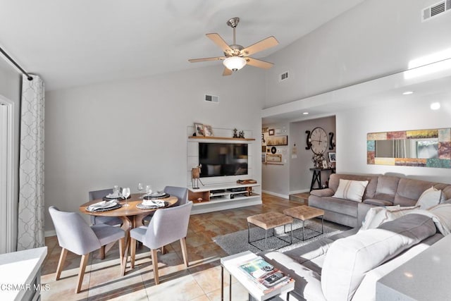 living room featuring high vaulted ceiling and ceiling fan