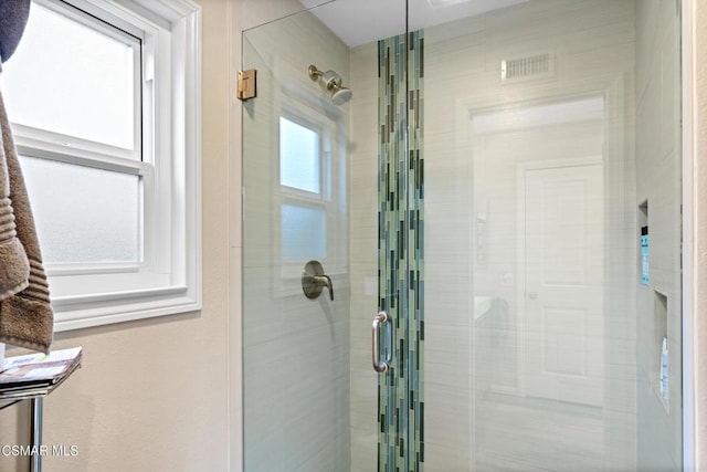 bathroom featuring walk in shower