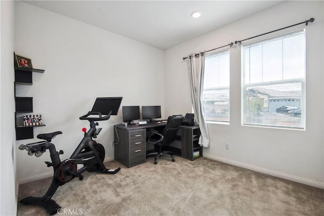 home office featuring light carpet