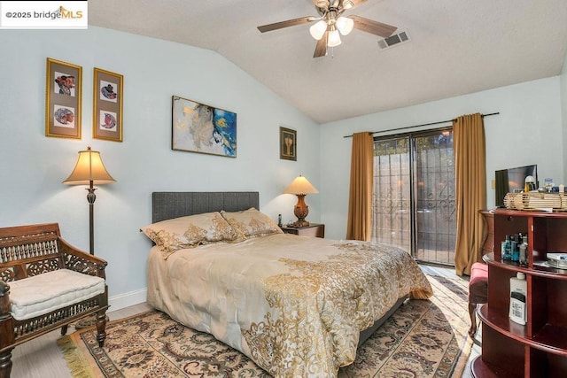 bedroom with vaulted ceiling, ceiling fan, and access to outside