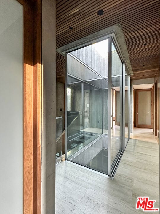 interior space with wood ceiling