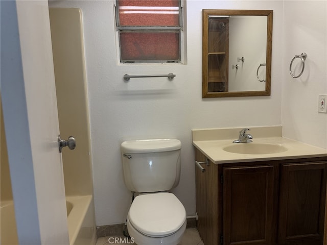 full bath featuring vanity and toilet