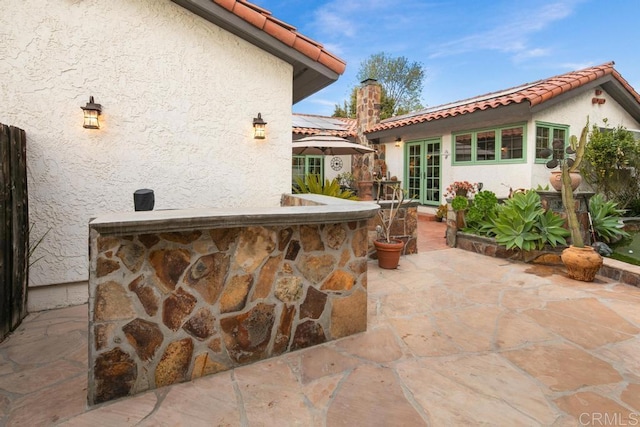 view of patio / terrace featuring french doors