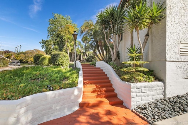 view of yard featuring stairs