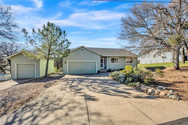 ranch-style home featuring a garage