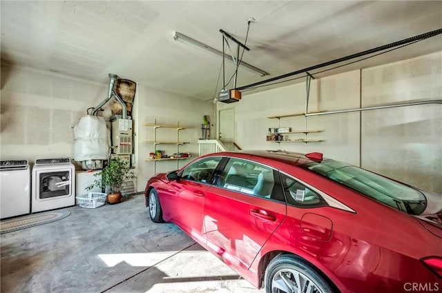 garage featuring a garage door opener and washing machine and dryer