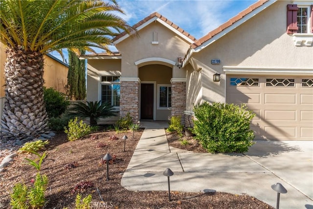 view of front of property with a garage