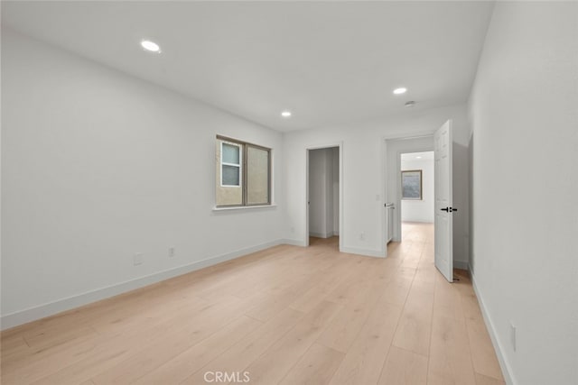 unfurnished bedroom with light hardwood / wood-style floors