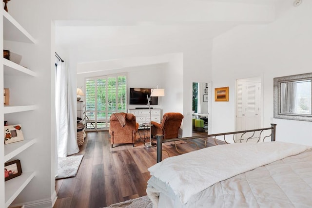 bedroom with hardwood / wood-style floors