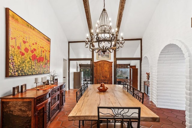 tiled dining space with high vaulted ceiling and beamed ceiling