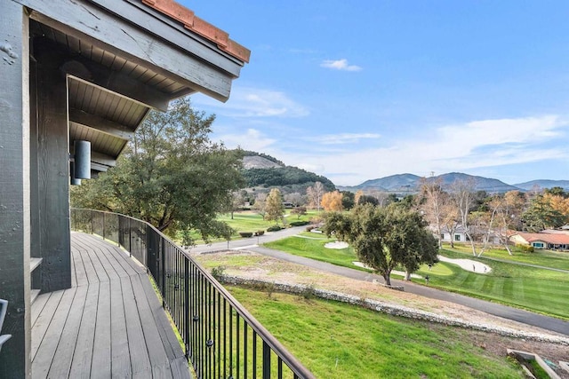 wooden terrace with a mountain view