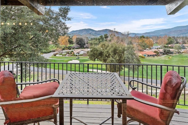 balcony featuring a mountain view