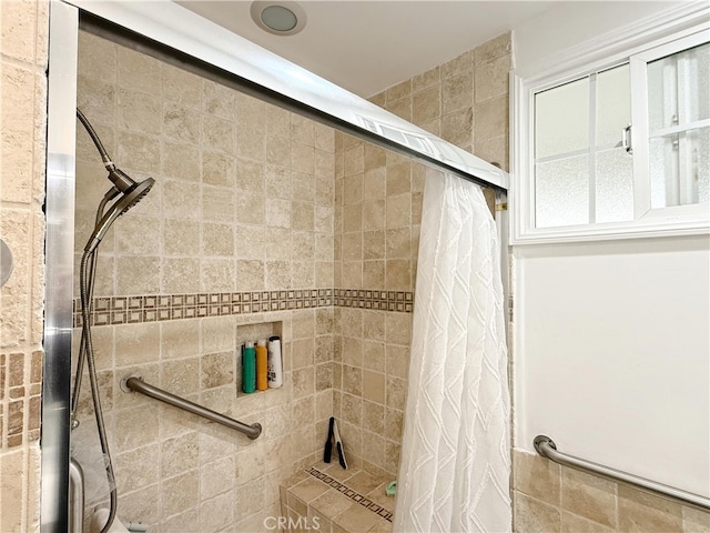 bathroom with curtained shower