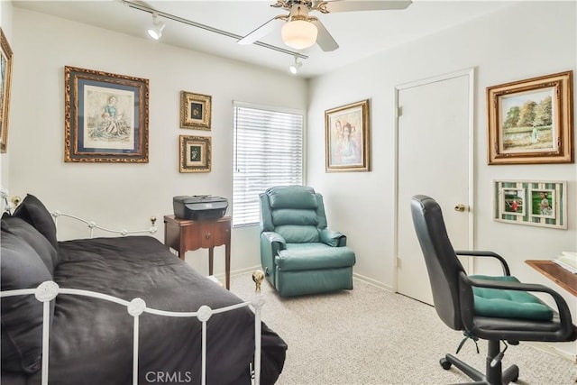 bedroom featuring carpet floors, ceiling fan, and track lighting