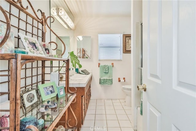 bathroom featuring tile patterned flooring and toilet