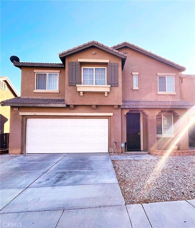 view of front of property featuring a garage