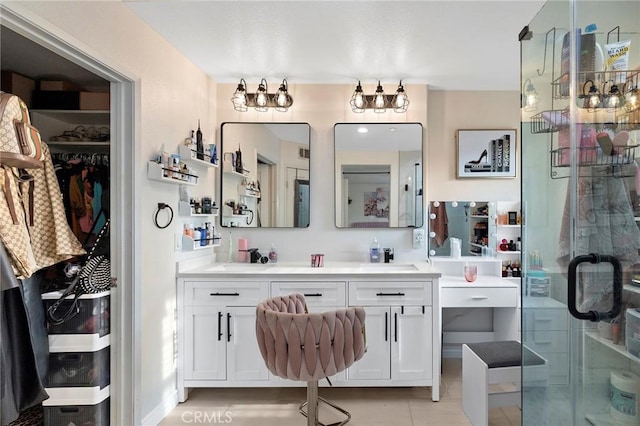 bathroom with vanity and walk in shower