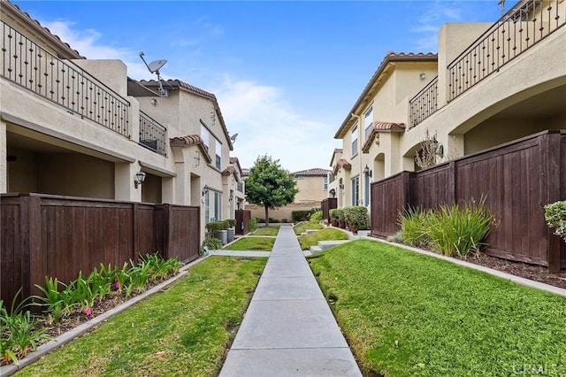 view of community with a lawn