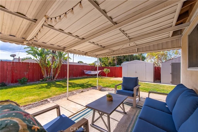 view of patio / terrace with a storage shed and outdoor lounge area