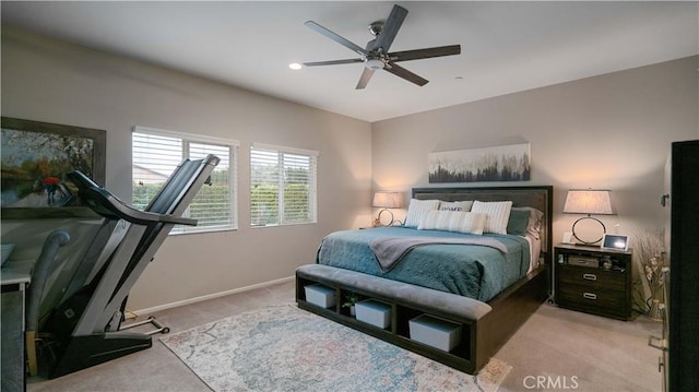 carpeted bedroom featuring ceiling fan