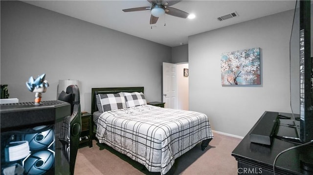 carpeted bedroom with ceiling fan