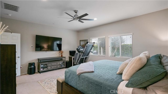 carpeted bedroom featuring ceiling fan