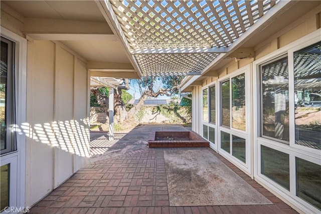 view of patio featuring a pergola