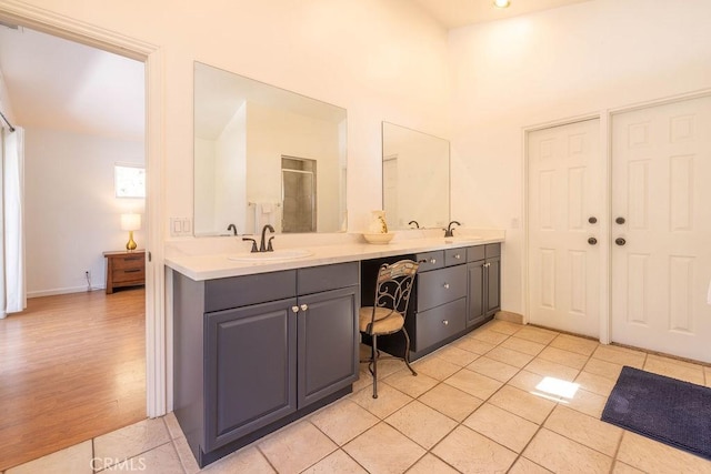 bathroom with vanity and tile patterned floors