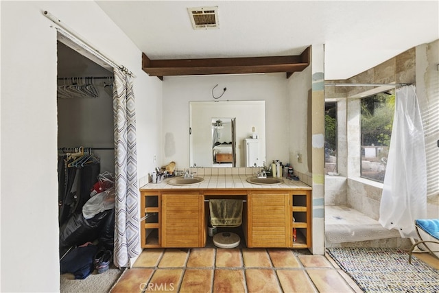 bathroom with vanity, beamed ceiling, and a shower with shower curtain